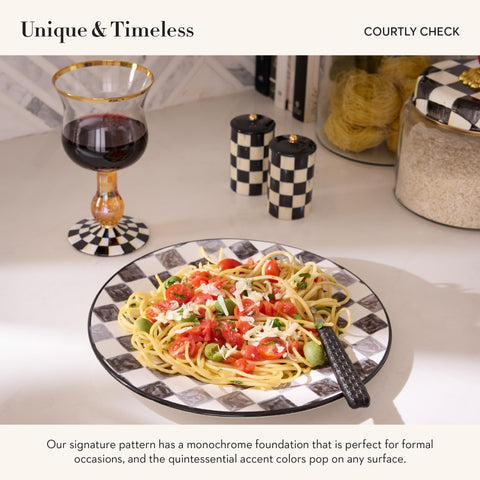 MacKenzie-Childs pepper shaker with gold luster ball adds a luxe touch.