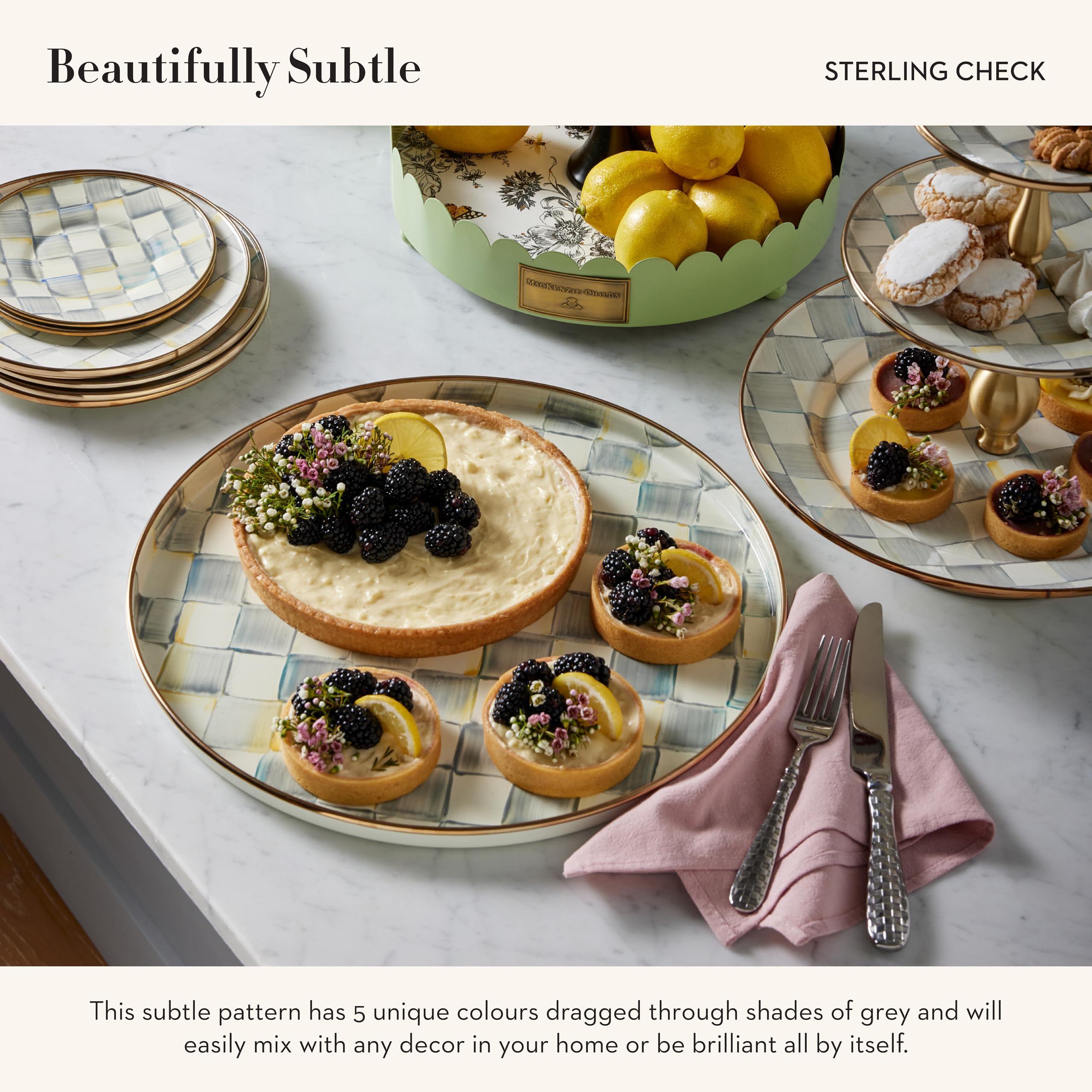 MACKENZIE-CHILDS enamel round tray ready for drinks and appetizers