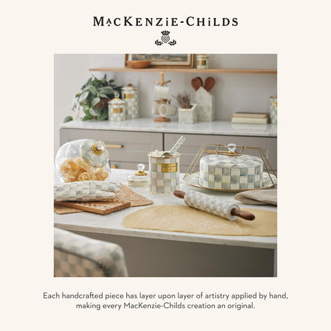 MACKENZIE-CHILDS enamel round tray makes a gift-ready statement piece