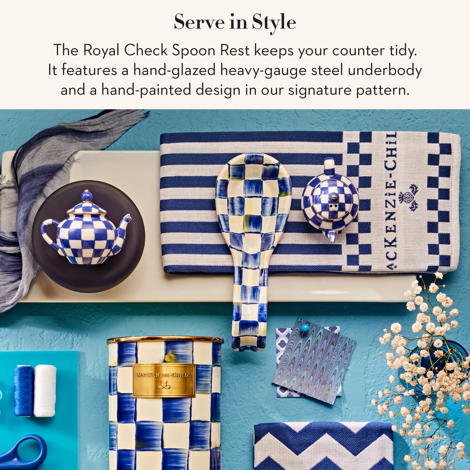 MacKenzie-Childs enamel spoon rest on stovetop captures Royal Check style for stylish organization.