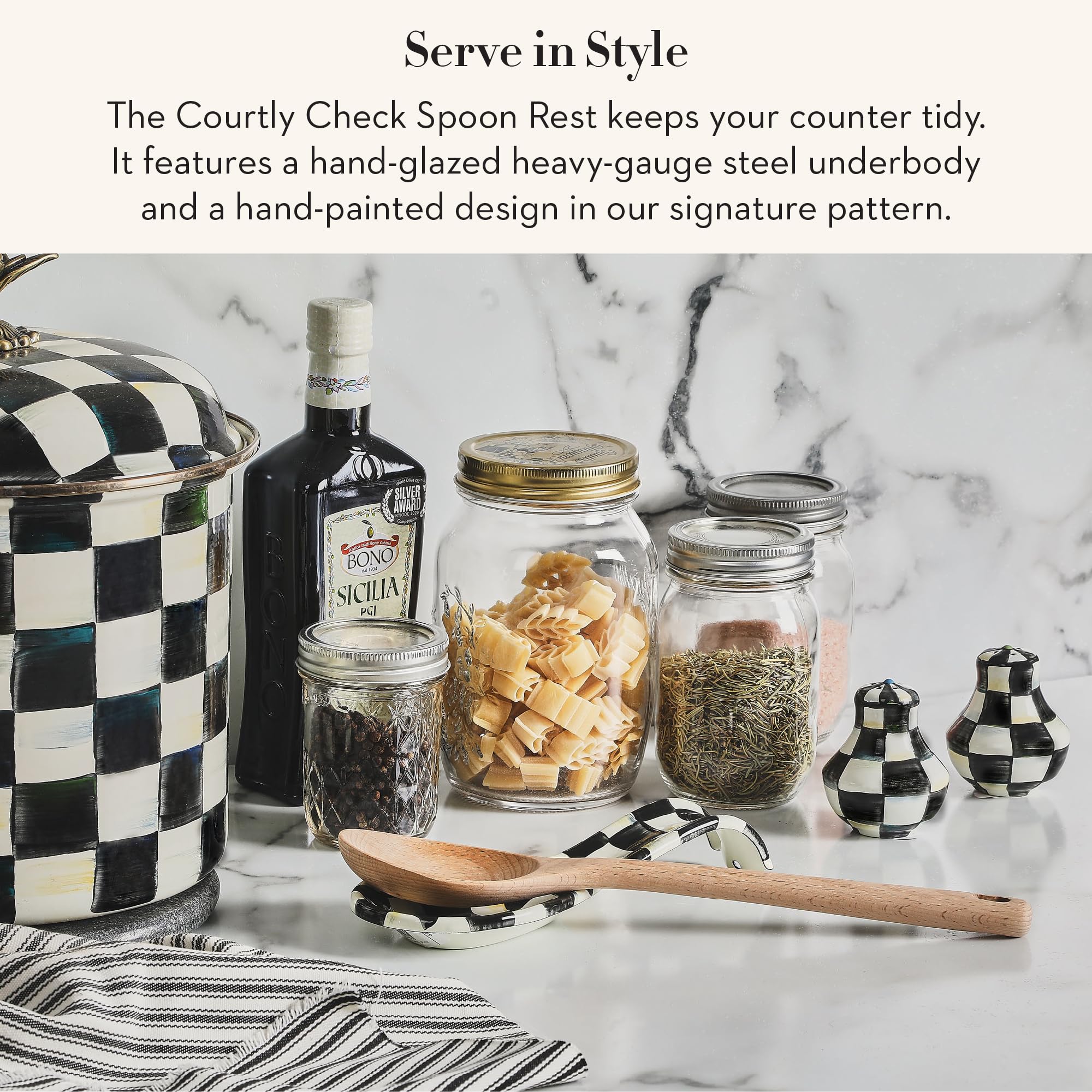 Mackenzie-Childs Courtly Check spoon rest on kitchen counter adds elegant organization.