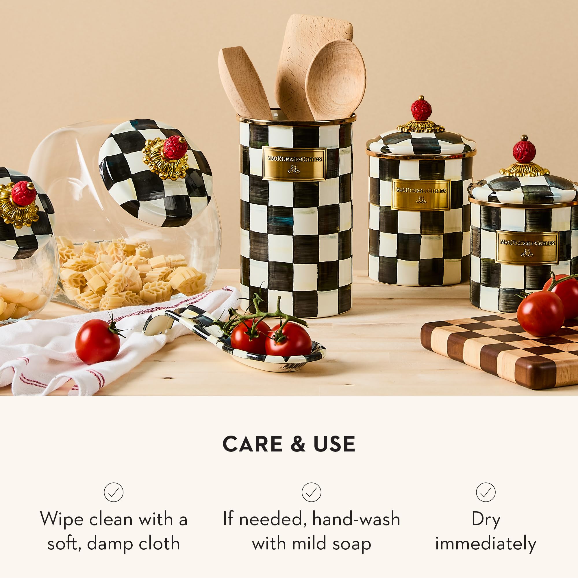 Mackenzie-Childs enamel spoon rest signals refined kitchen decor and practical counter support.