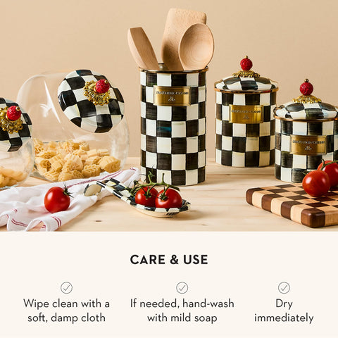 Mackenzie-Childs enamel spoon rest signals refined kitchen decor and practical counter support.