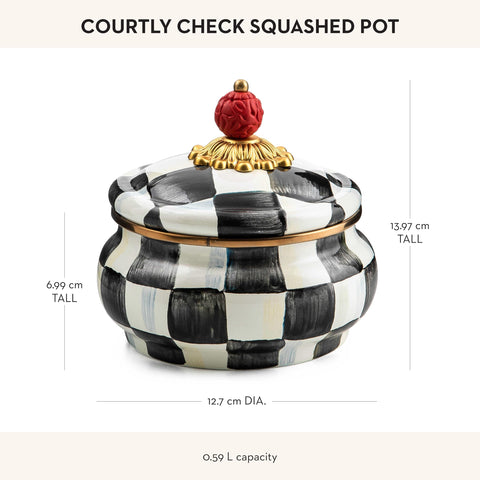 MacKenzie-Childs enamel squashed pot on kitchen counter adds decorative storage