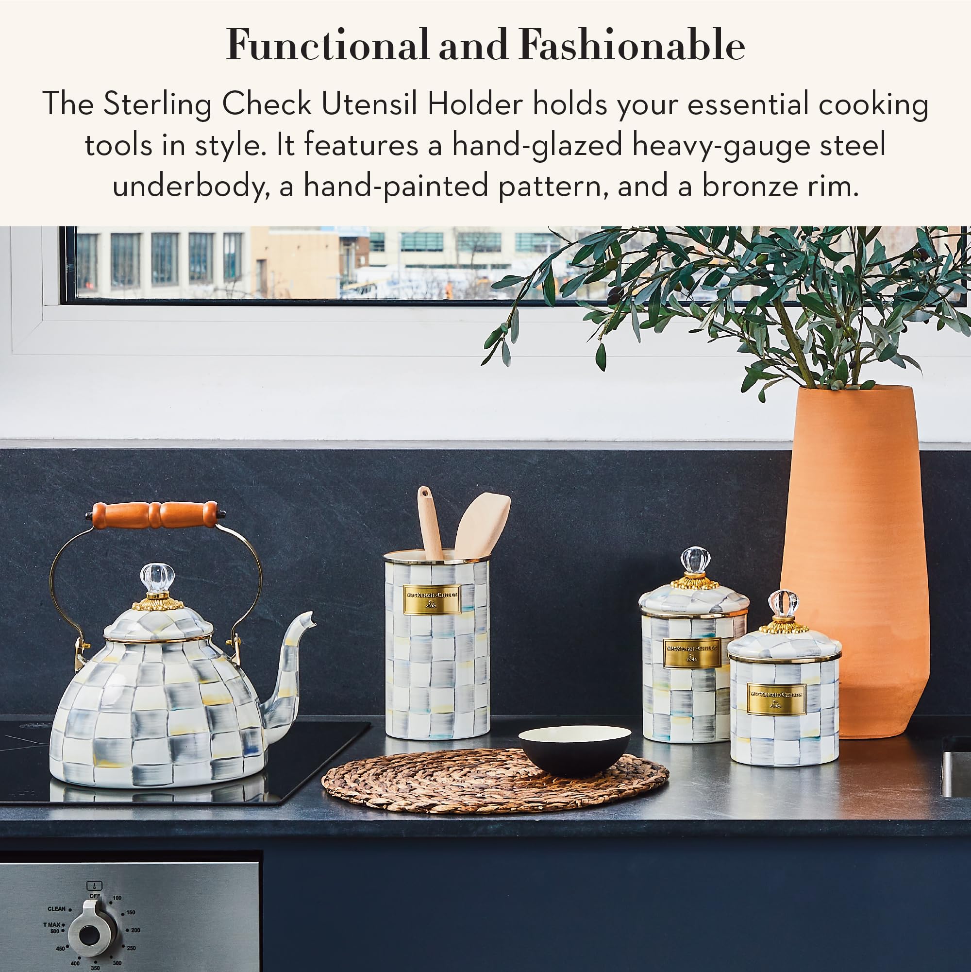 MacKenzie-Childs enamel utensil holder closeup highlights Sterling Check finish.