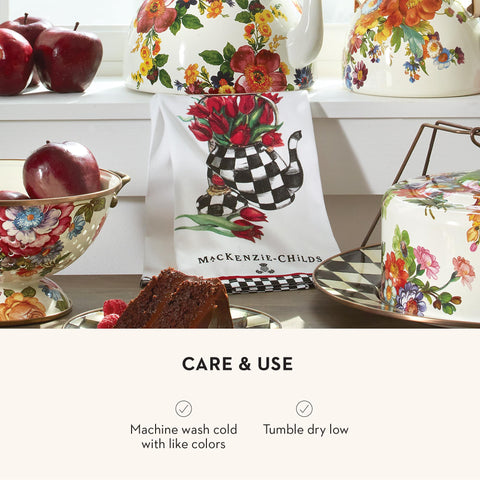 MacKenzie-Childs kitchen towel hanging to showcase modern decor idea.
