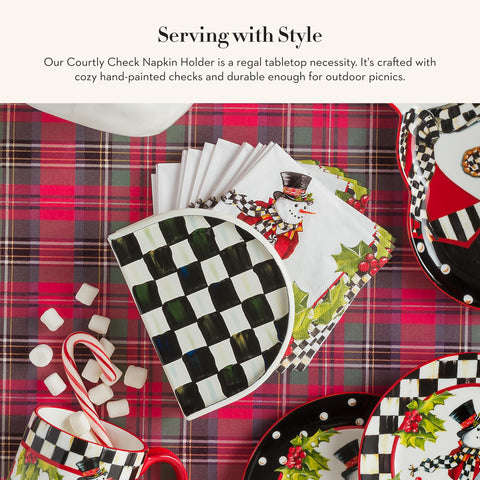 MACKENZIE-CHILDS napkin holder with glossy enamel finish boosts table decor.