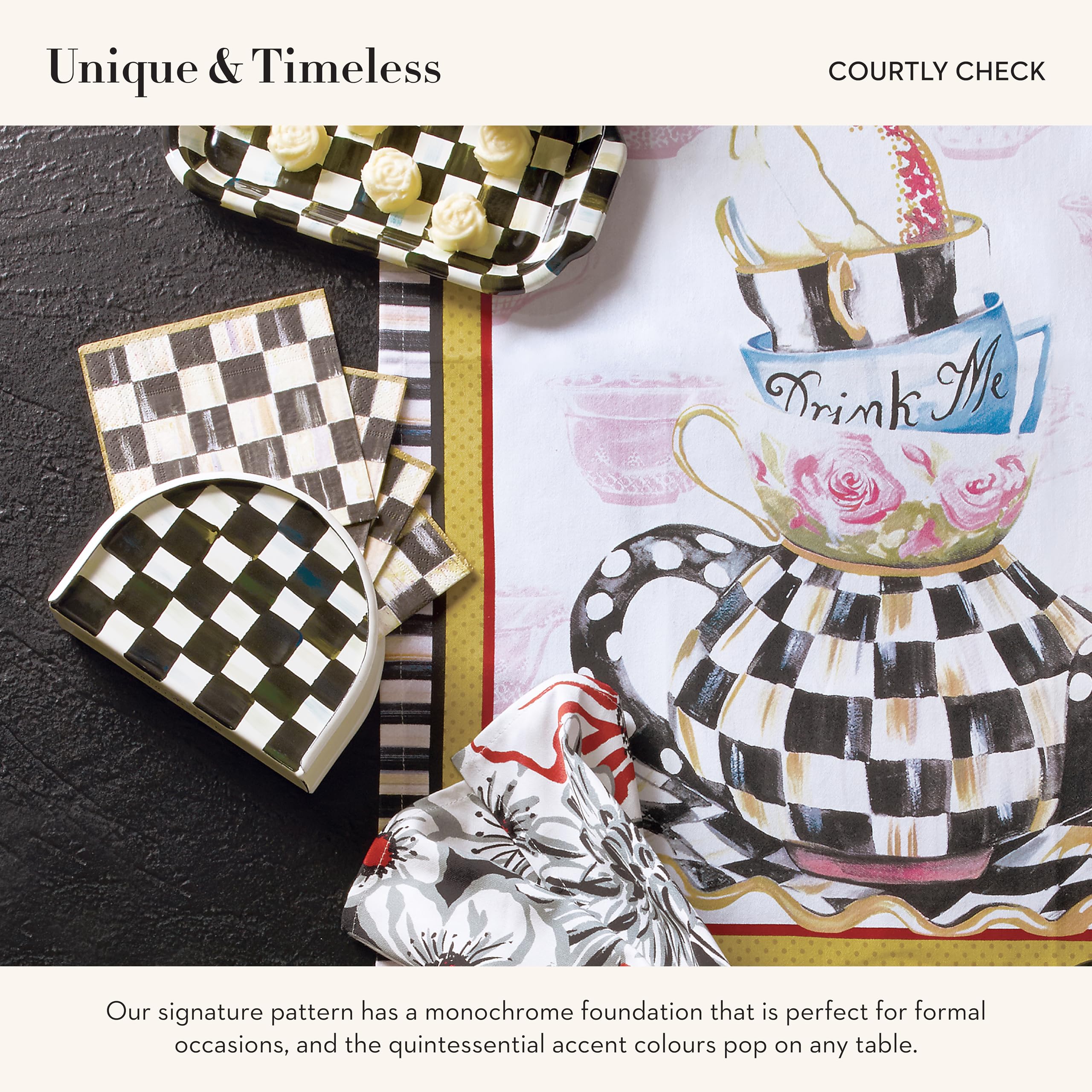 MACKENZIE-CHILDS napkin holder on table display elevates dining moments.