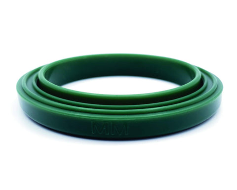 MacMaxe 54mm steam ring close-up showing precise fit and silicone texture for leaks.