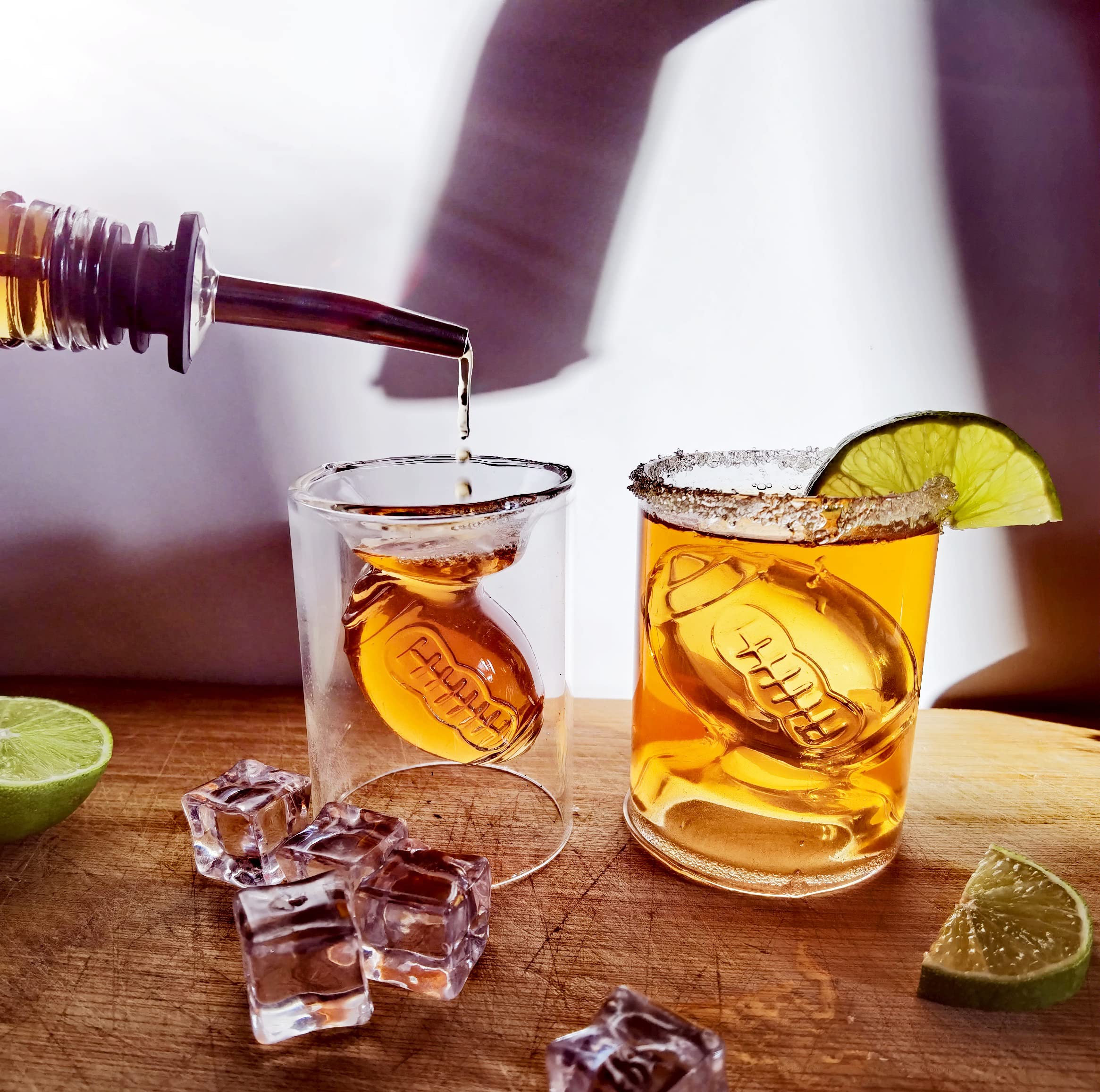 MADARC SPORT transparent shot glasses as a stylish football party accessory.