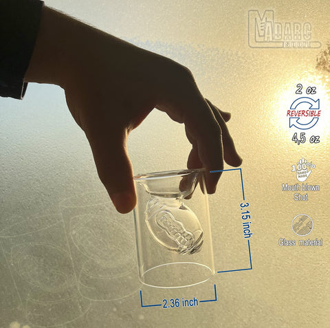 MADARC SPORT reversible football-design shot glasses for flexible pouring options.