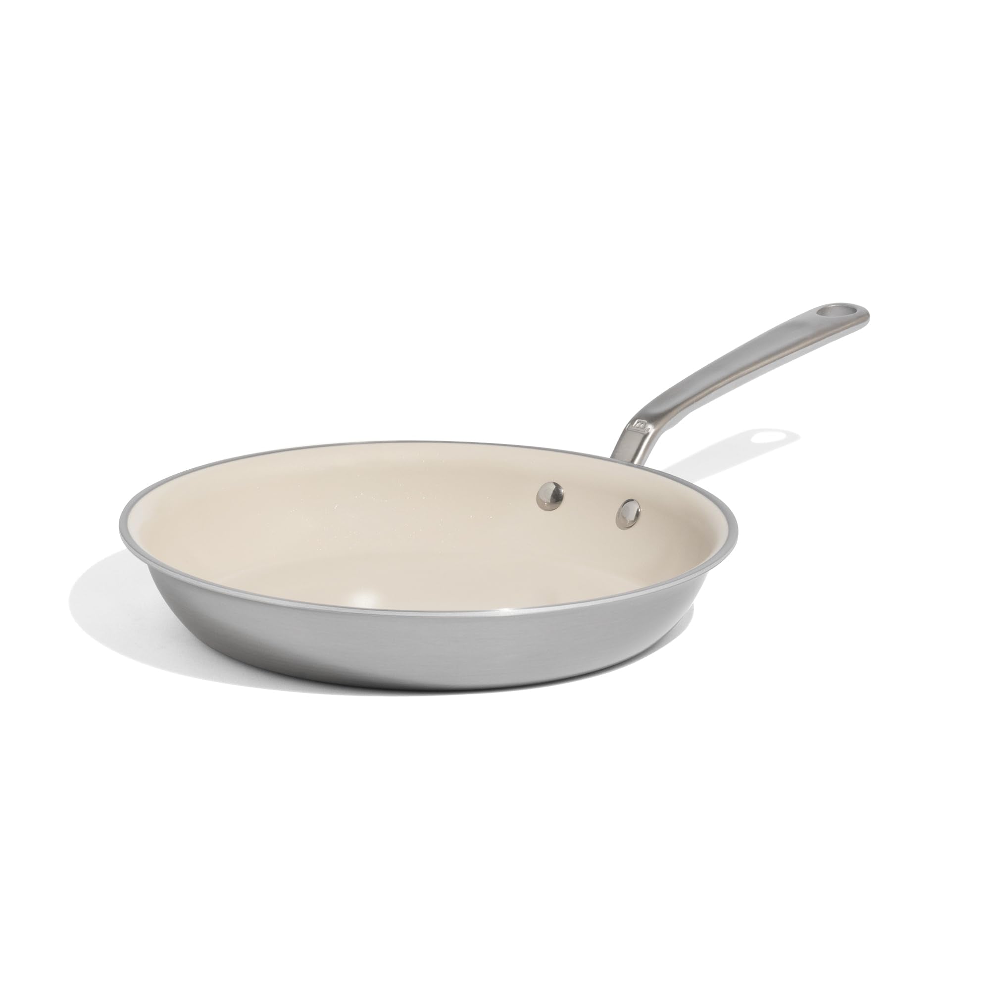 Made In 10-inch ceramic nonstick pan with stainless handle for versatile searing.