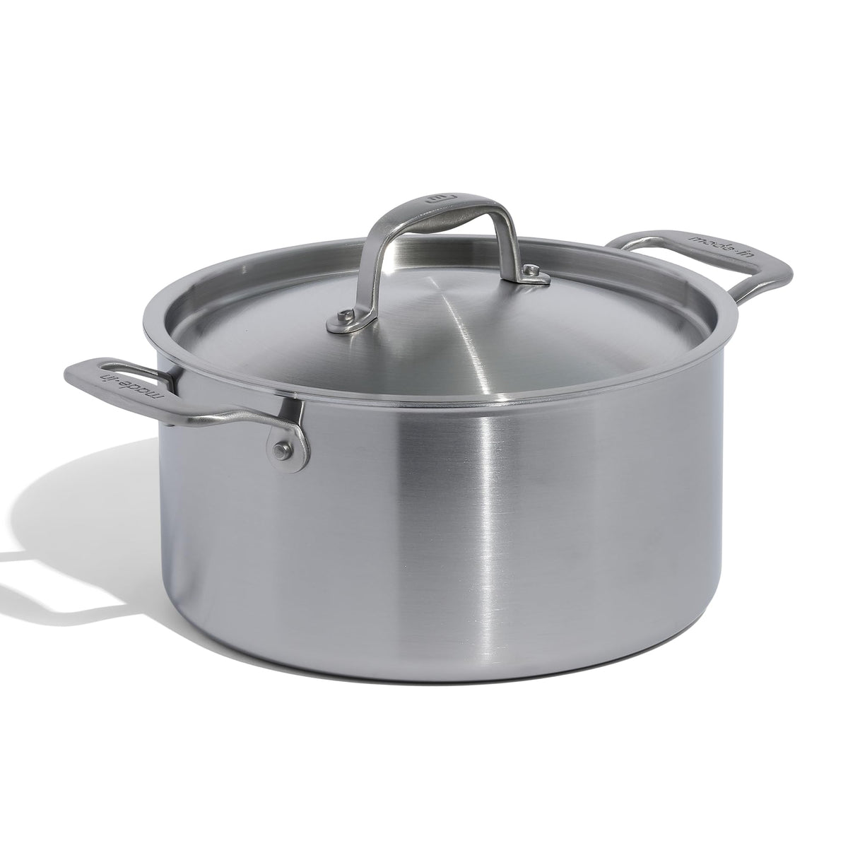 Made In 6-quart stock pot with stainless clad body for even heat distribution.