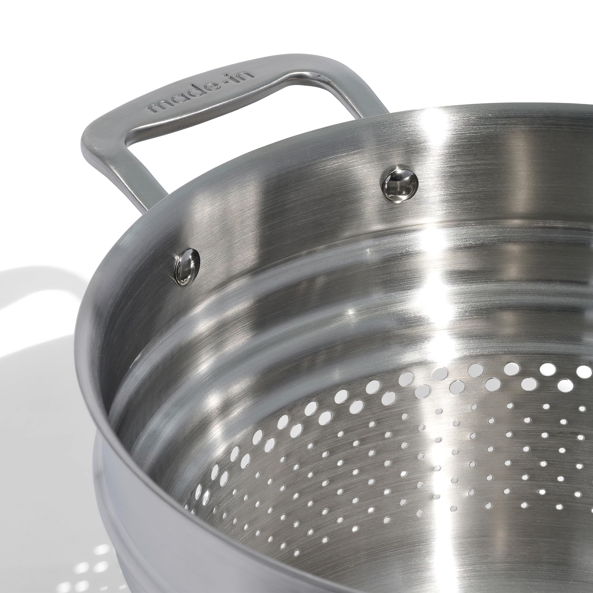 Close-up of Made In pasta insert highlights 5-layer construction for durable cooking