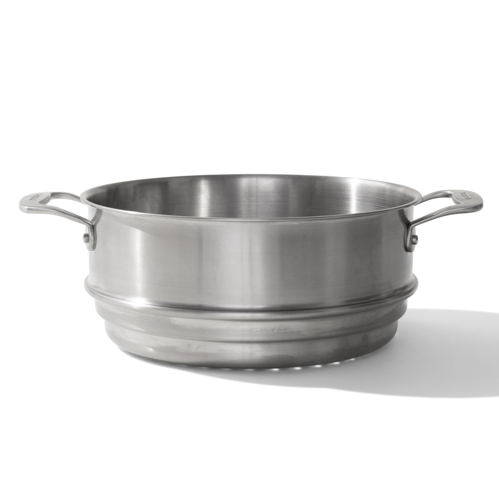 Made In steamer insert resting on the stock pot for even steaming.