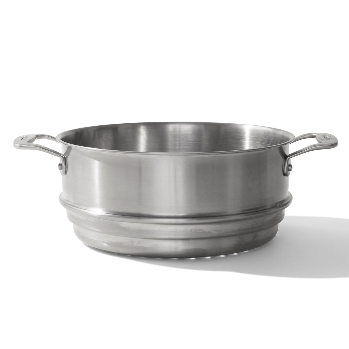 Made In steamer insert resting on the stock pot for even steaming.