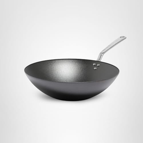 Made In wok seasoning progress improves natural nonstick for easy food release.