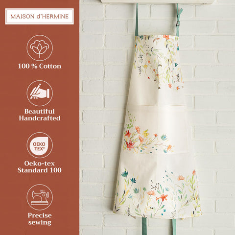 Maison d’ Hermine apron featuring a vibrant watercolor pattern inspired by European motifs.