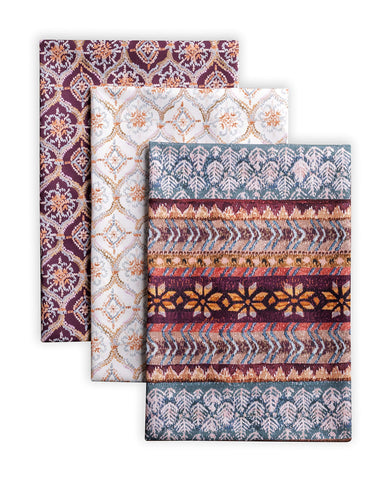 Maison d'Hermine Fair Isle towels showcase festive hand-painted design.