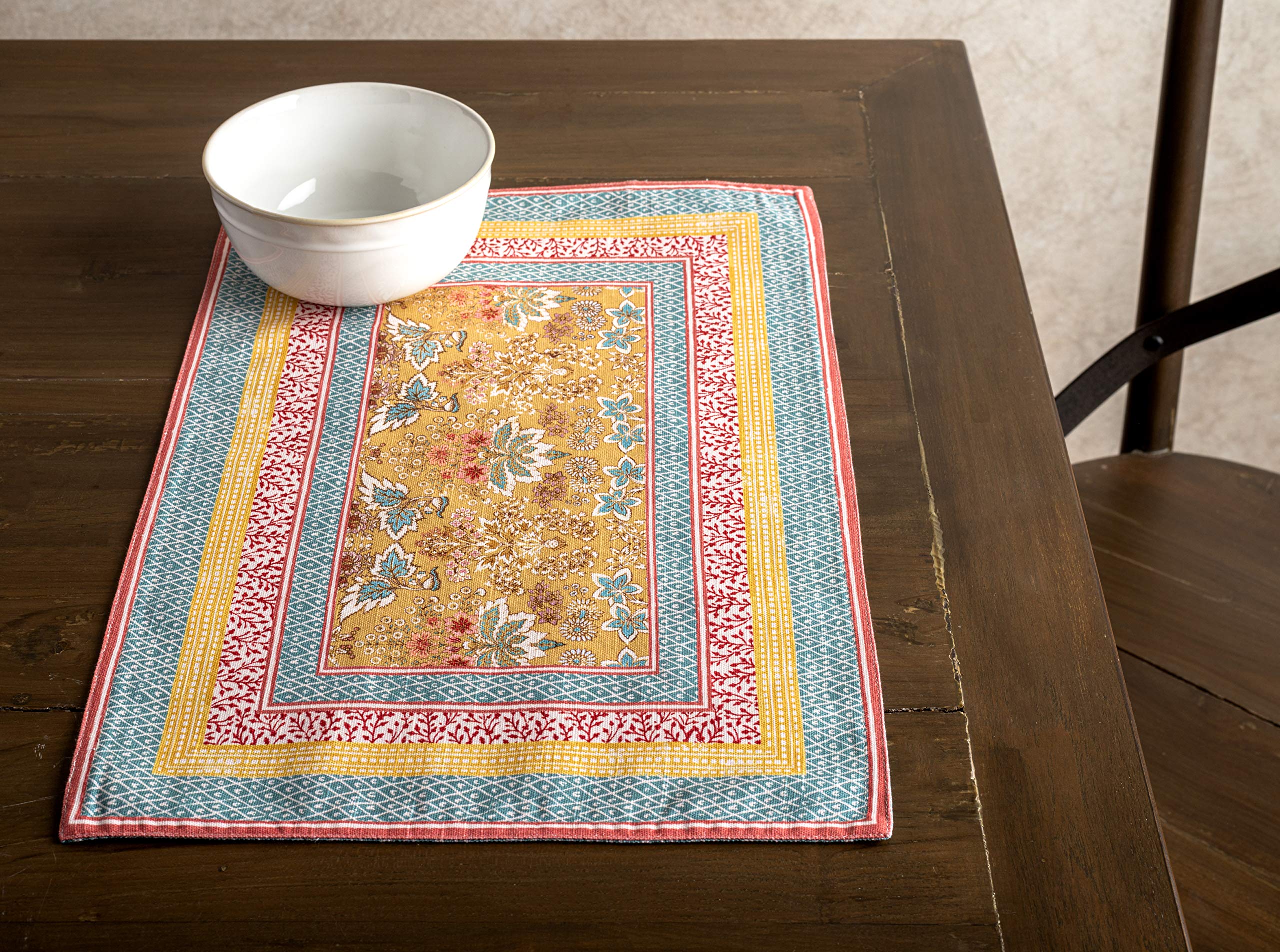 Maison d'Hermine wedding dining setup with vibrant European motifs.