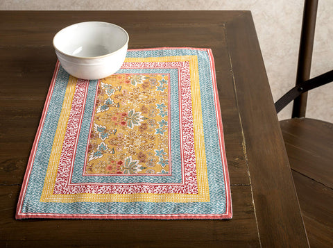 Maison d'Hermine wedding dining setup with vibrant European motifs.