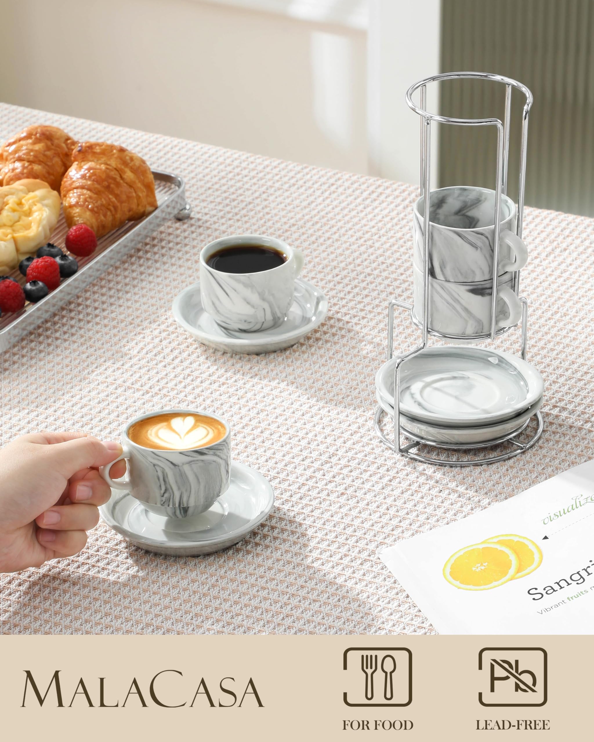 MALACASA cups and saucers arranged in a neat, elegant display
