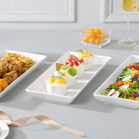 MALACASA wedding dessert table centerpiece with white trays.