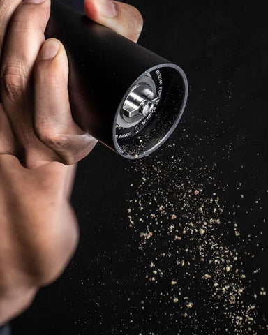 MANNKITCHEN Pepper Cannon burrs provide consistent texture from coarse to fine.