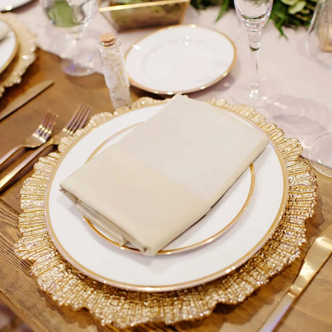 MAONAME gold-edged charger serves as decorative centerpiece base