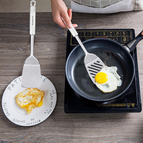 Maphyton slotted turner for draining sauces while serving.