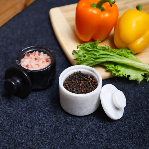 Marble Hives spice and herb storage on a counter for quick access