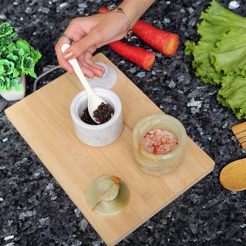 Marble Hives spice storage accessories promote decluttering and quick seasoning at meals.