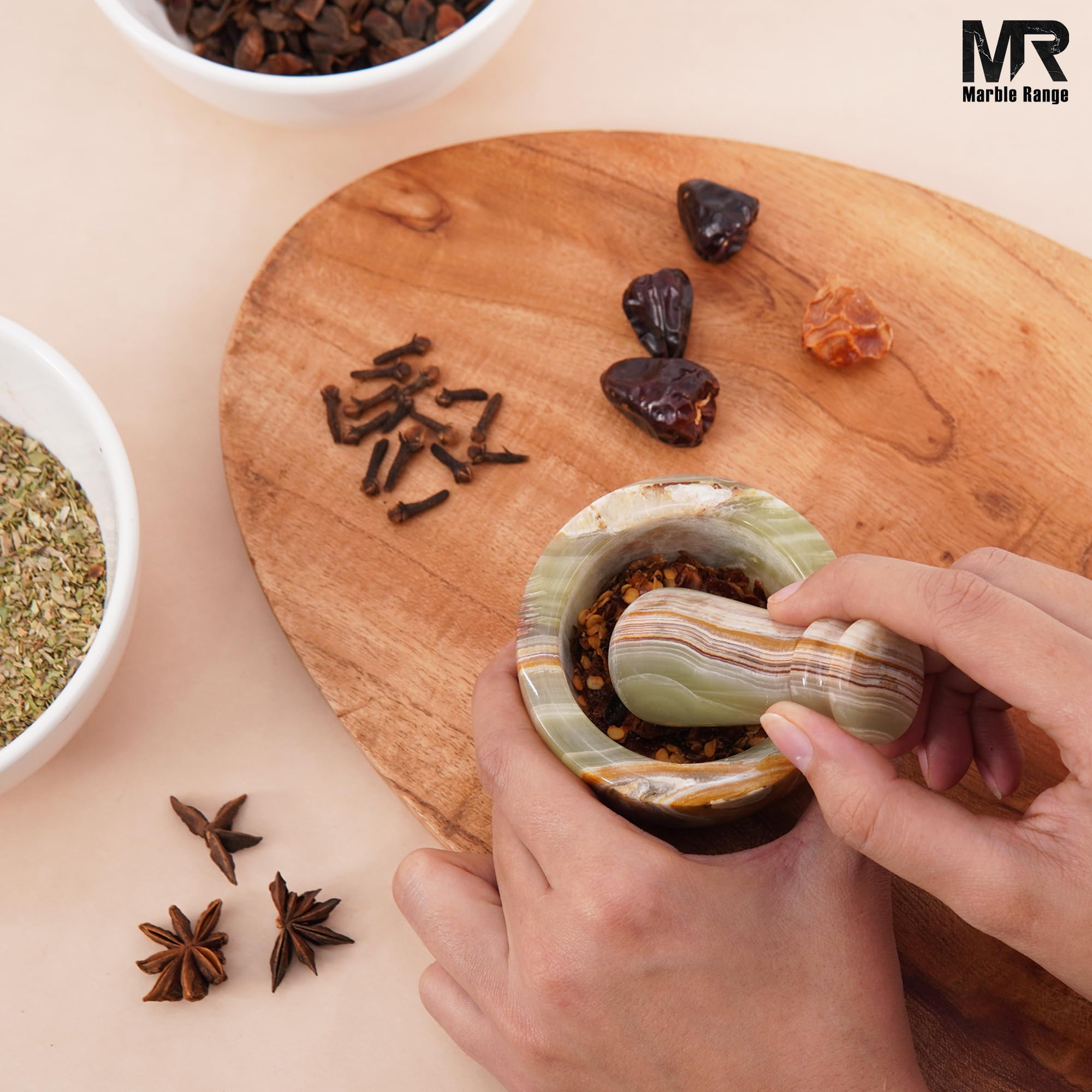 MARBLE RANGE handmade mortar-pestle closeup showcases natural marble texture for stylish prep