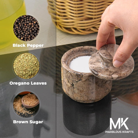MARBLOUS KRAFTS marble salt cellar lid protects contents and keeps countertop tidy.