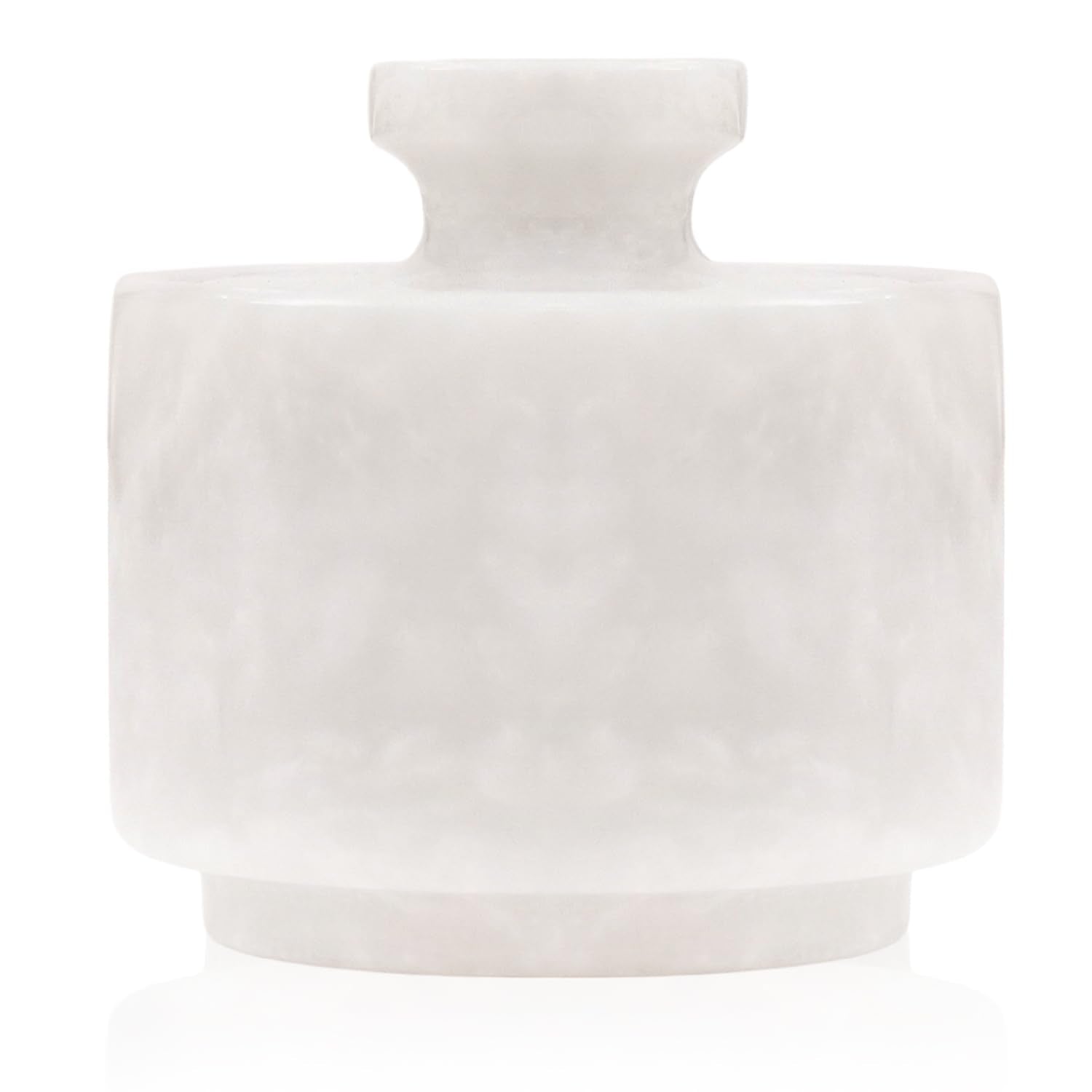 MARBLOUS KRAFTS marble salt cellar with lid on a kitchen counter for spice storage.