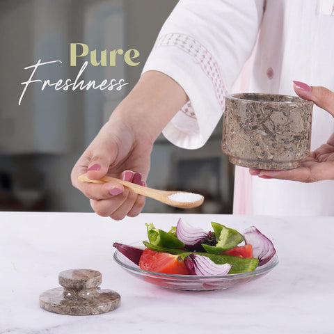 MARBLOUS KRAFTS oceanic salt jar on the counter for easy, mess-free seasoning.