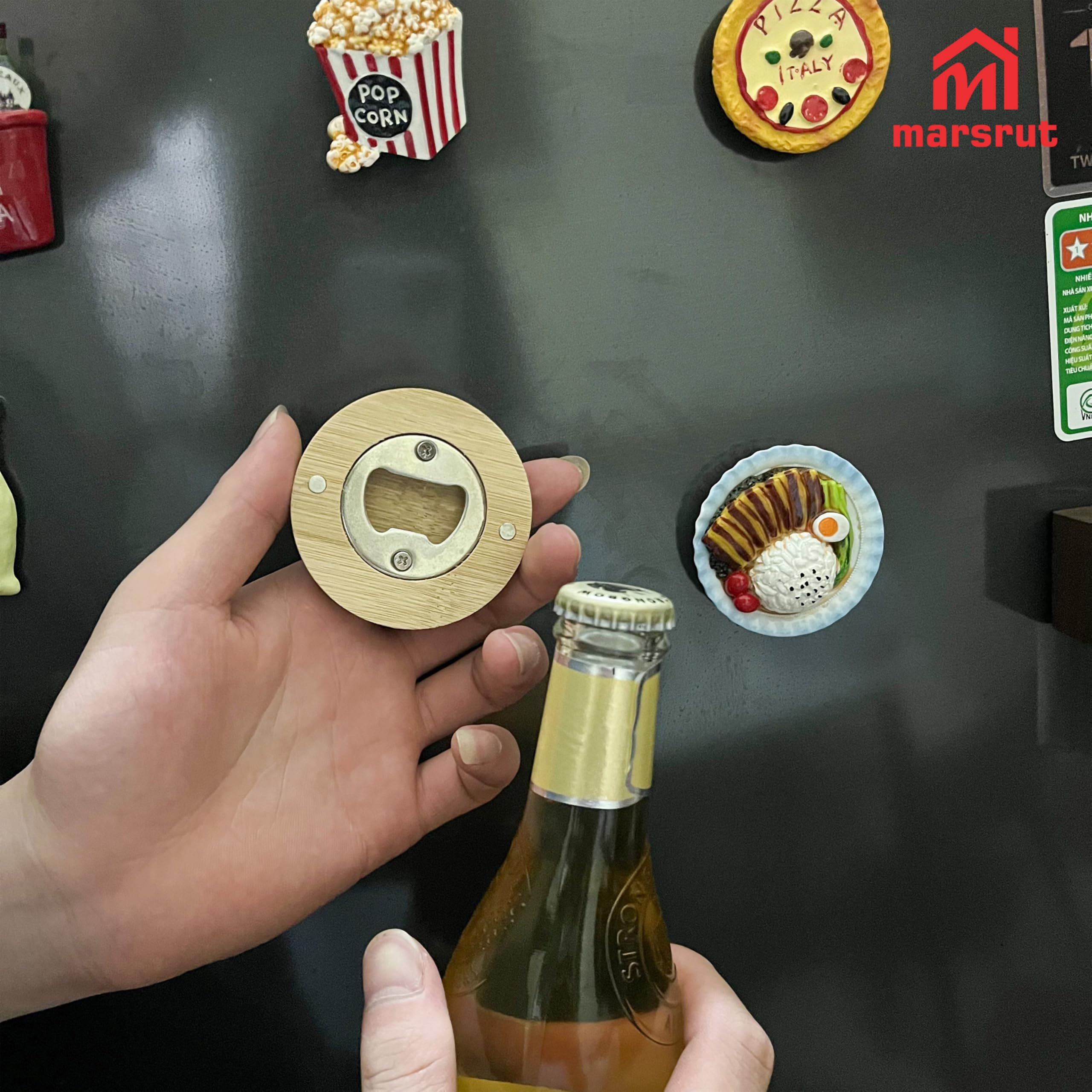 Marsrut magnetic bottle opener sticks securely to fridge shelves.