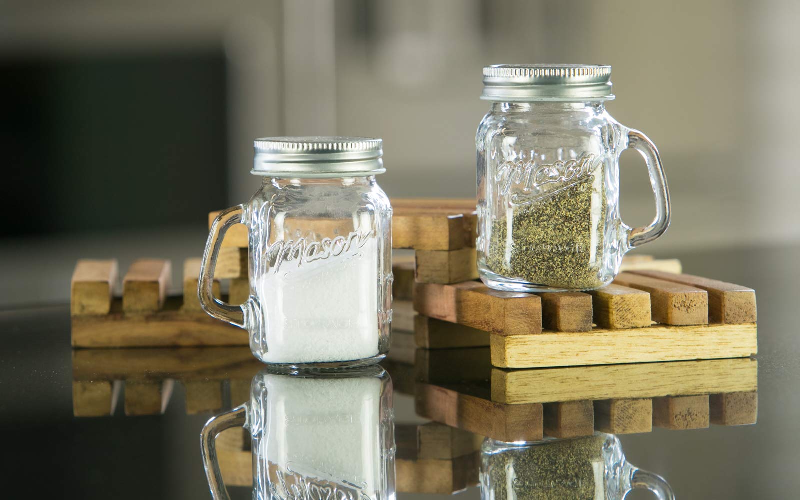 Mason Craft and More mason jar salt pepper shaker close-up shows glass clarity.