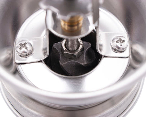 Grinder directs grounds directly into the jar