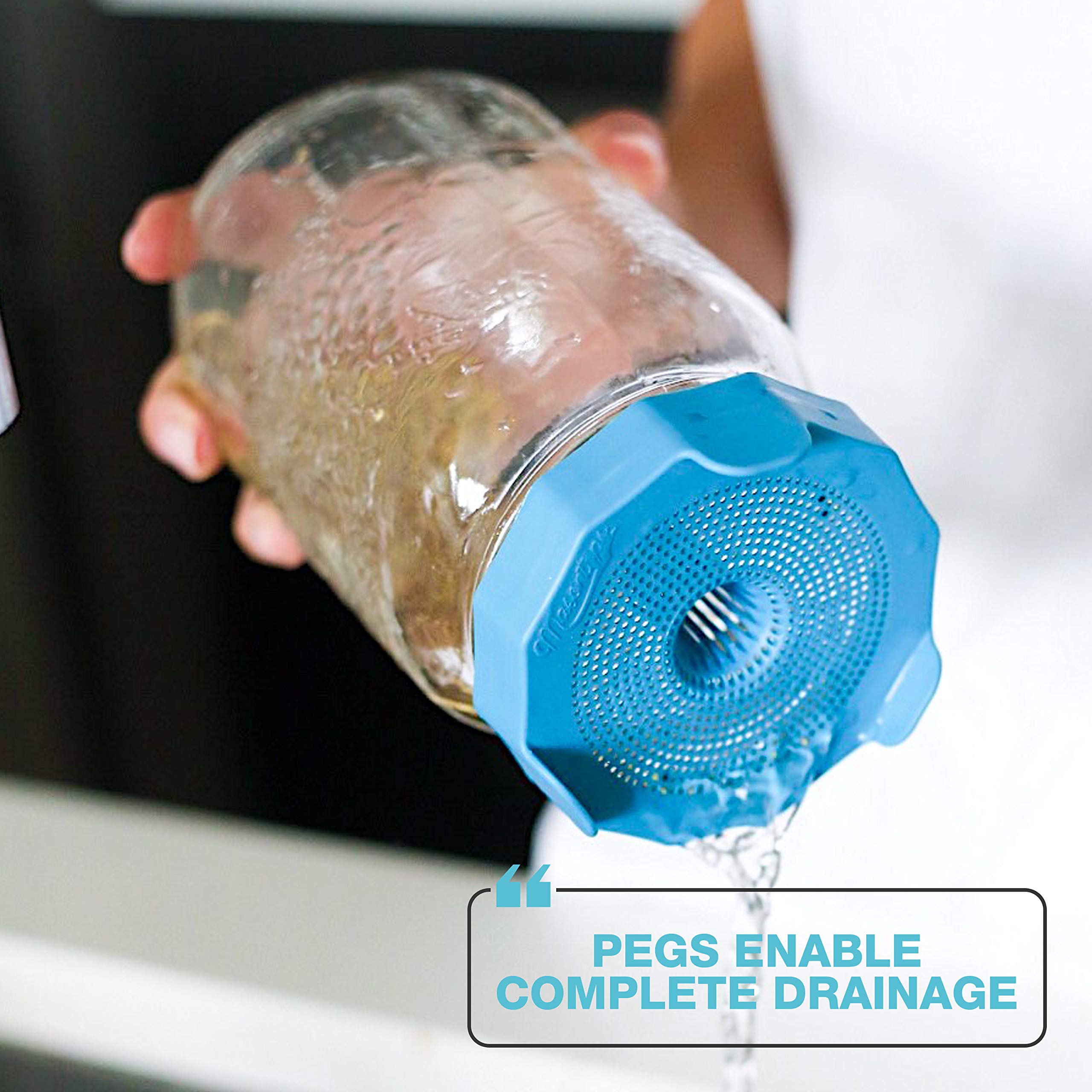 Inverted rinse spout on Masontops lid reduces splashing during rinsing.