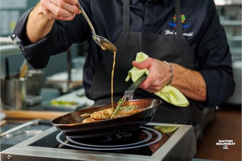 Matfer Bourgeat pan handle close-up highlighting welded durable construction