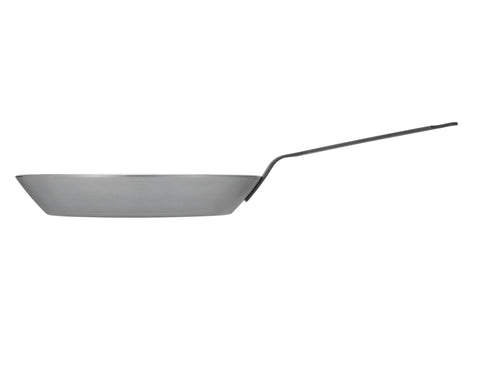 Matfer Bourgeat oven-ready versatility extends from kitchen stove to open flame.