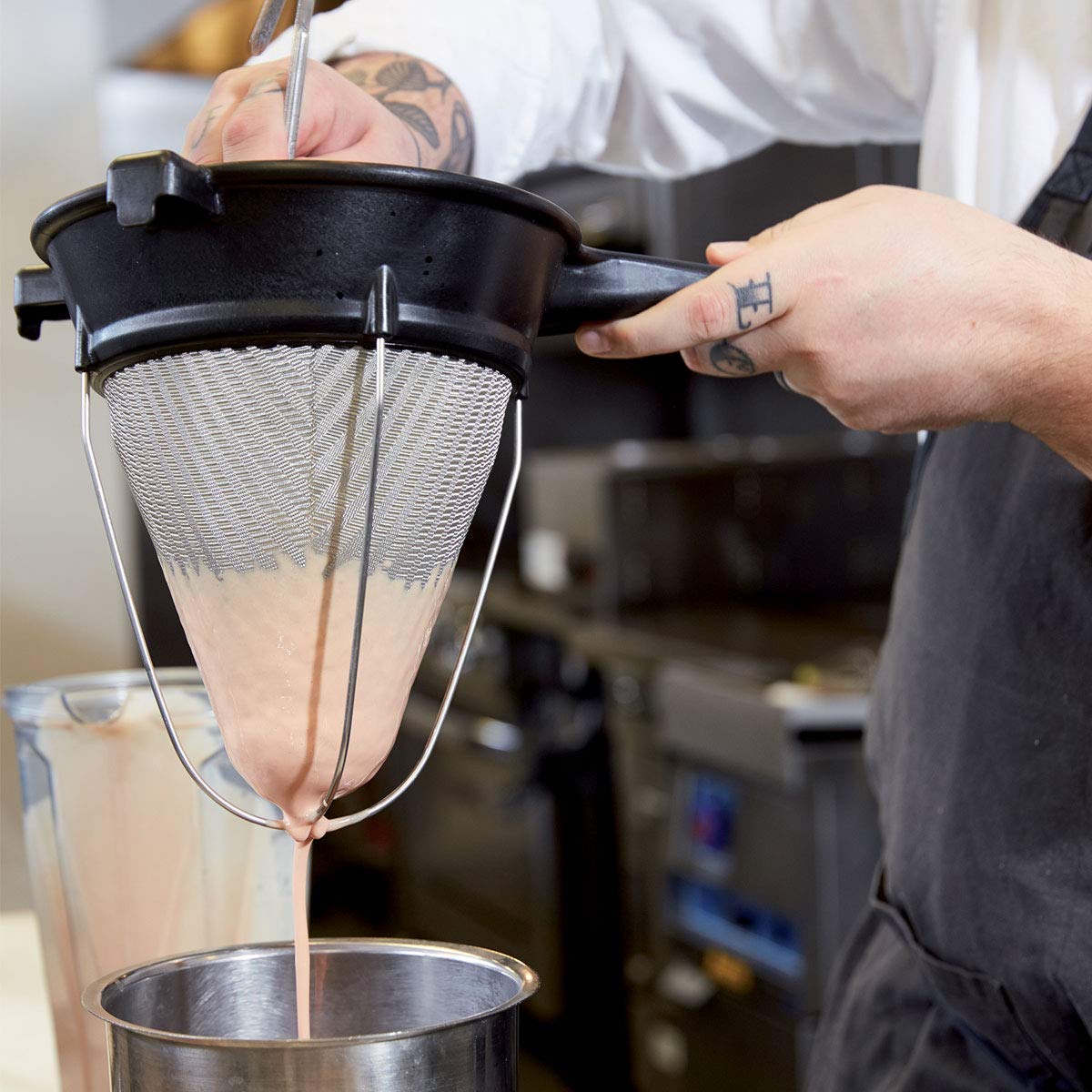 Matfer Bourgeat double woven mesh strainer closeup, durable for sauces and delicate custards.