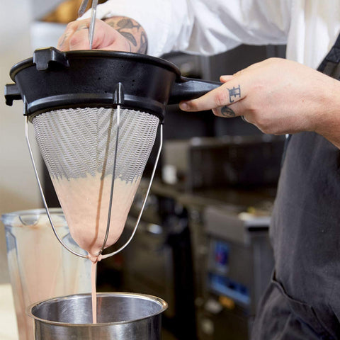 Matfer Bourgeat double woven mesh strainer closeup, durable for sauces and delicate custards.