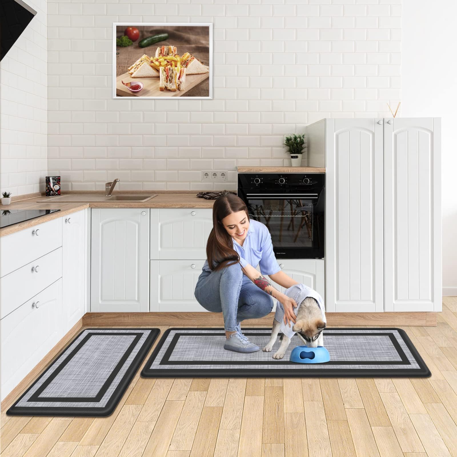 Mats placed by sink and stove offer convenient standing comfort.