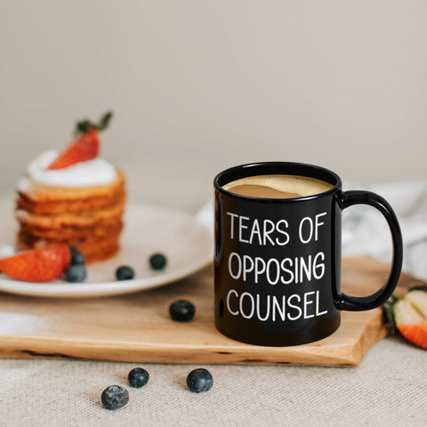 Maustic Tears of Opposing Counsel mug side handle, secure grip for hot beverages.