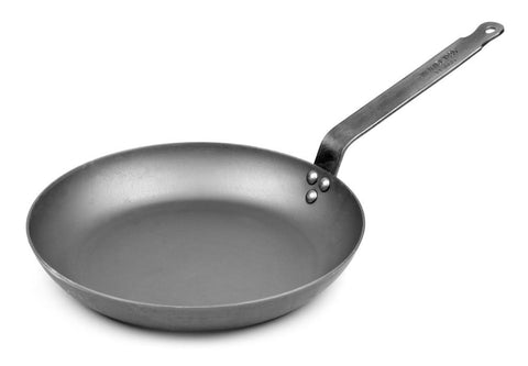Mauviel M'Steel frying pan with iron handle for quick searing on all cooktops.