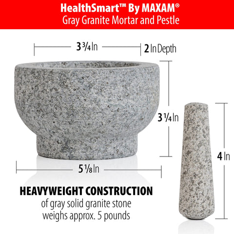 Maxam granite mortar and pestle grinding spices to release aroma.