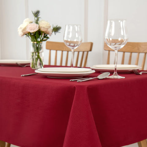 Maxmill red tablecloth on dining setup showing spill-proof surface for easy entertaining