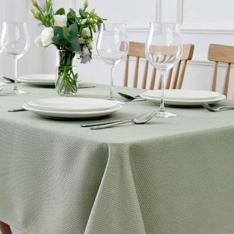 Maxmill water-resistant jacquard tablecloth protects surfaces during meals and celebrations.